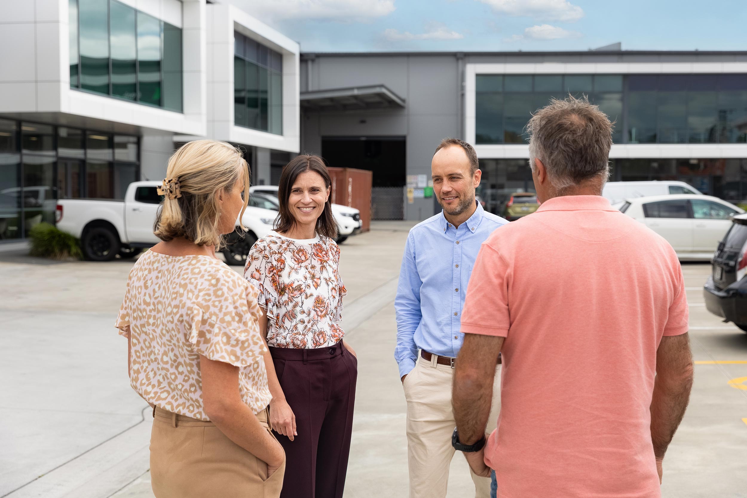 Group of lawyers casually chatting outside