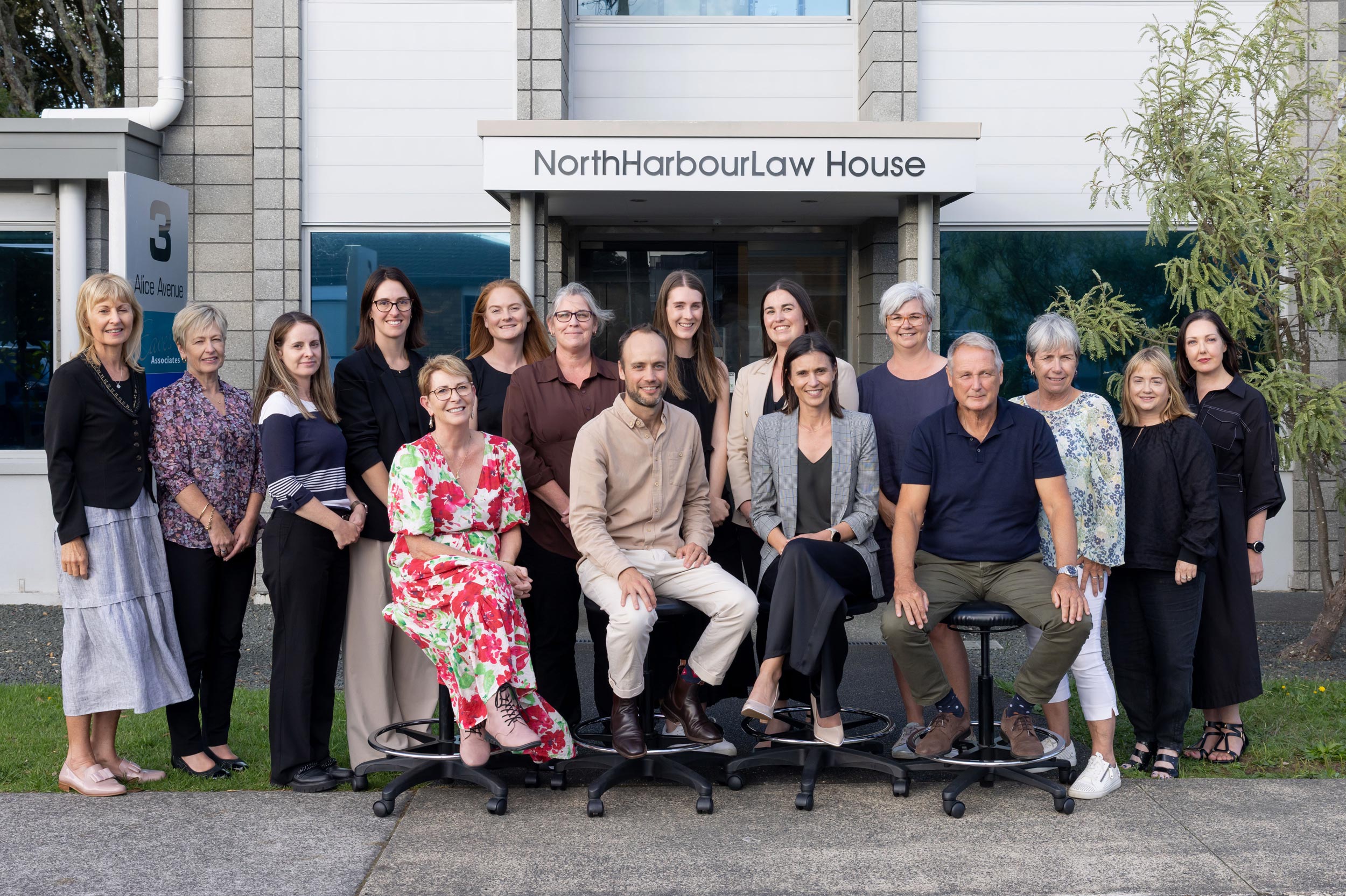 North Harbour Law staff group photo standing outside the front of the business